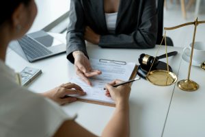 Businesswoman and lawyer discuss the contract document. Treaty of the law. Sign a contract business